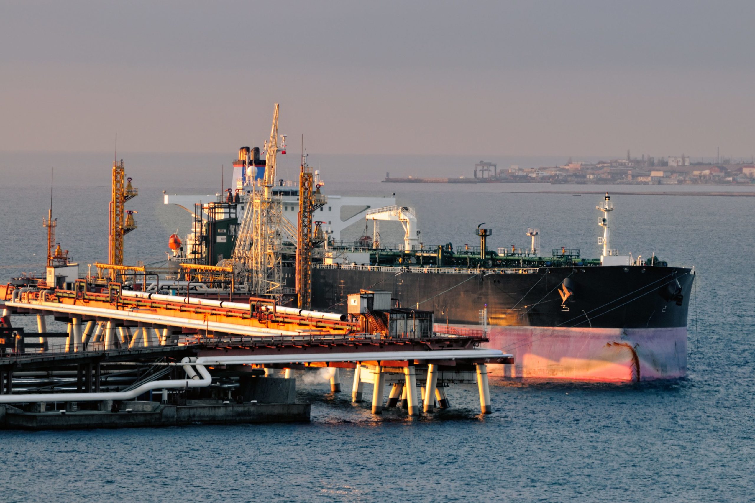 Supertanker loading at oil terminal