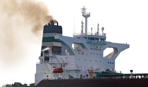 Wheelhouse tanker with an exhaust pipe. and black smoke