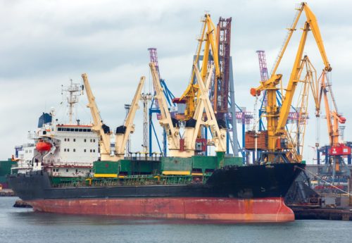 The sea bulk ship cargoship costs on loading of a load in seaport.