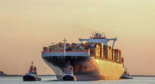 Containership entering or leaving the port