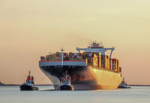 Containership entering or leaving the port