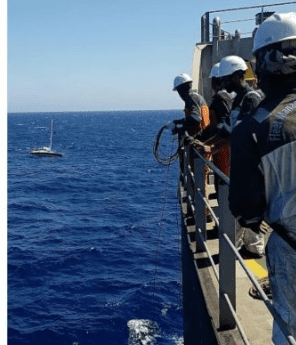 Fleet Management Rescues in Rough Weather Two Sailors