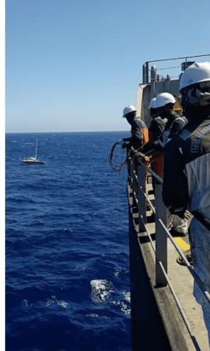 Fleet Management Rescues in Rough Weather Two Sailors