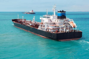 Oil product tanker is underway - view from the stern.