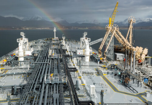 Deck view of an Oil product tanker loading from shore terminal