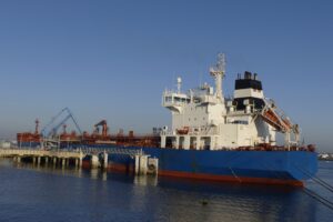 Blue Tanker ship discharging Petroleum products at the Oil Terminal