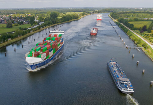 Ship traffic on the Kiel Canal or Nord-Ostsee-Kanal near Rendsburg, Germany.