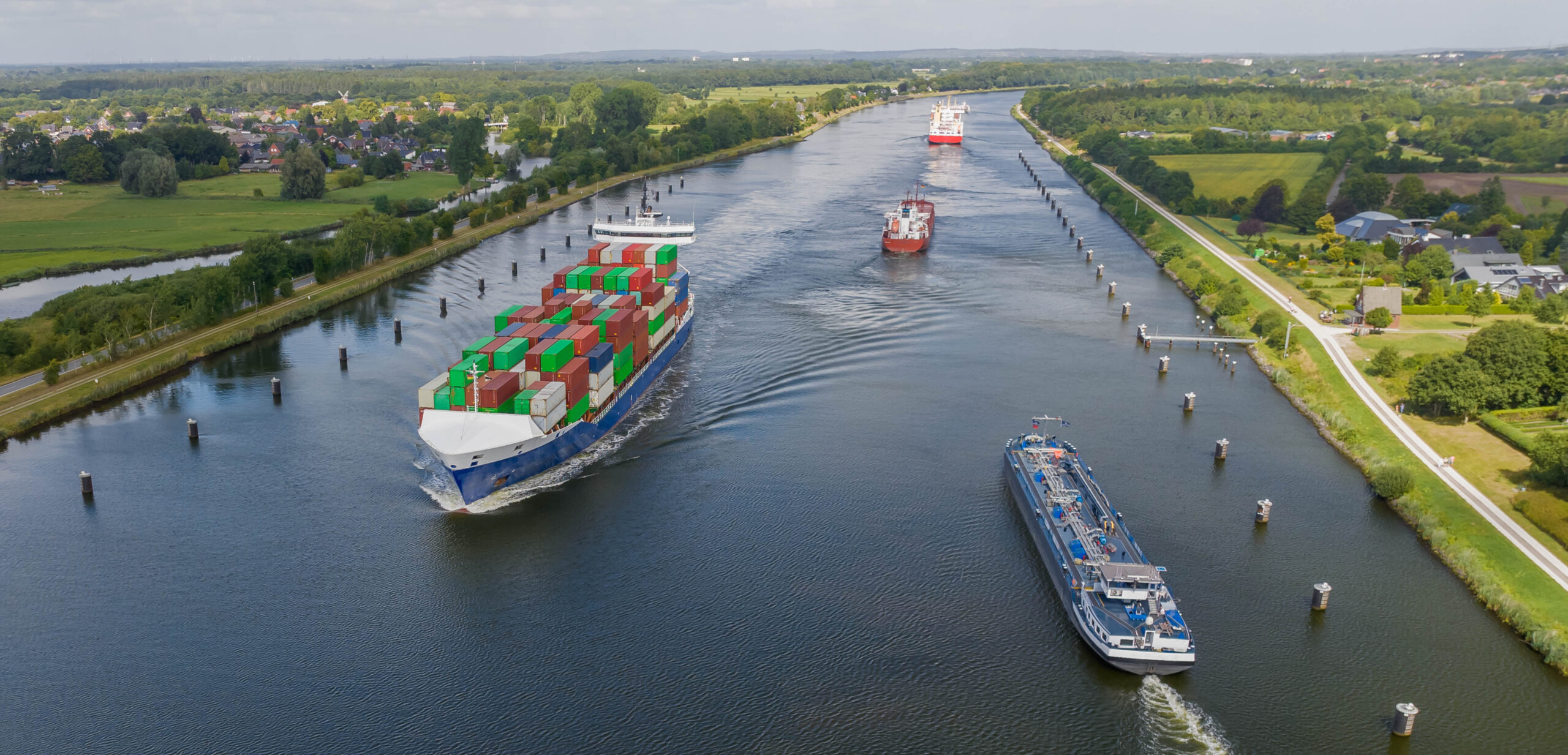 Ship traffic on the Kiel Canal or Nord-Ostsee-Kanal near Rendsburg, Germany.