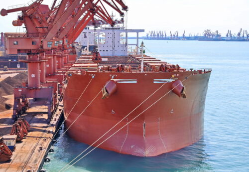 transshipment of bulk cargo iron ore in port of Rizhao, China