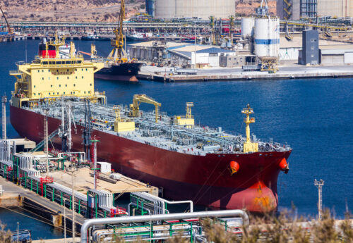 Product tanker discharging at oil terminal