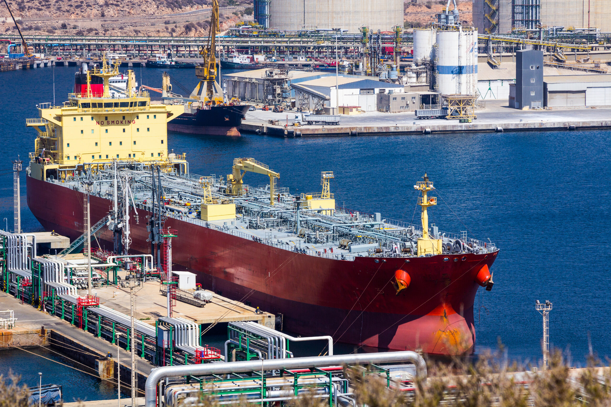 Product tanker discharging at oil terminal