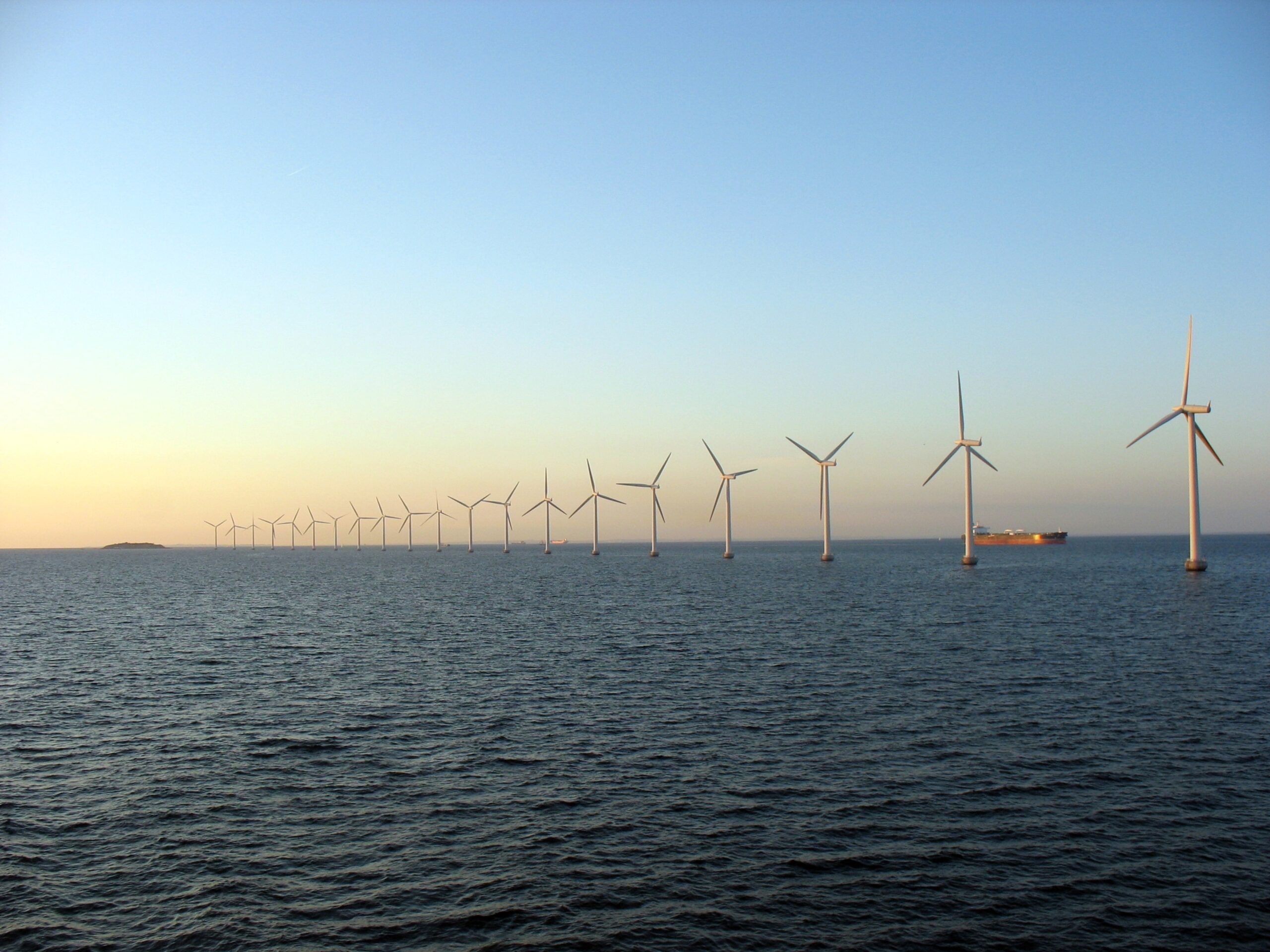 Offshore windfarm near Copenhagen in Denmark with a ship visible
