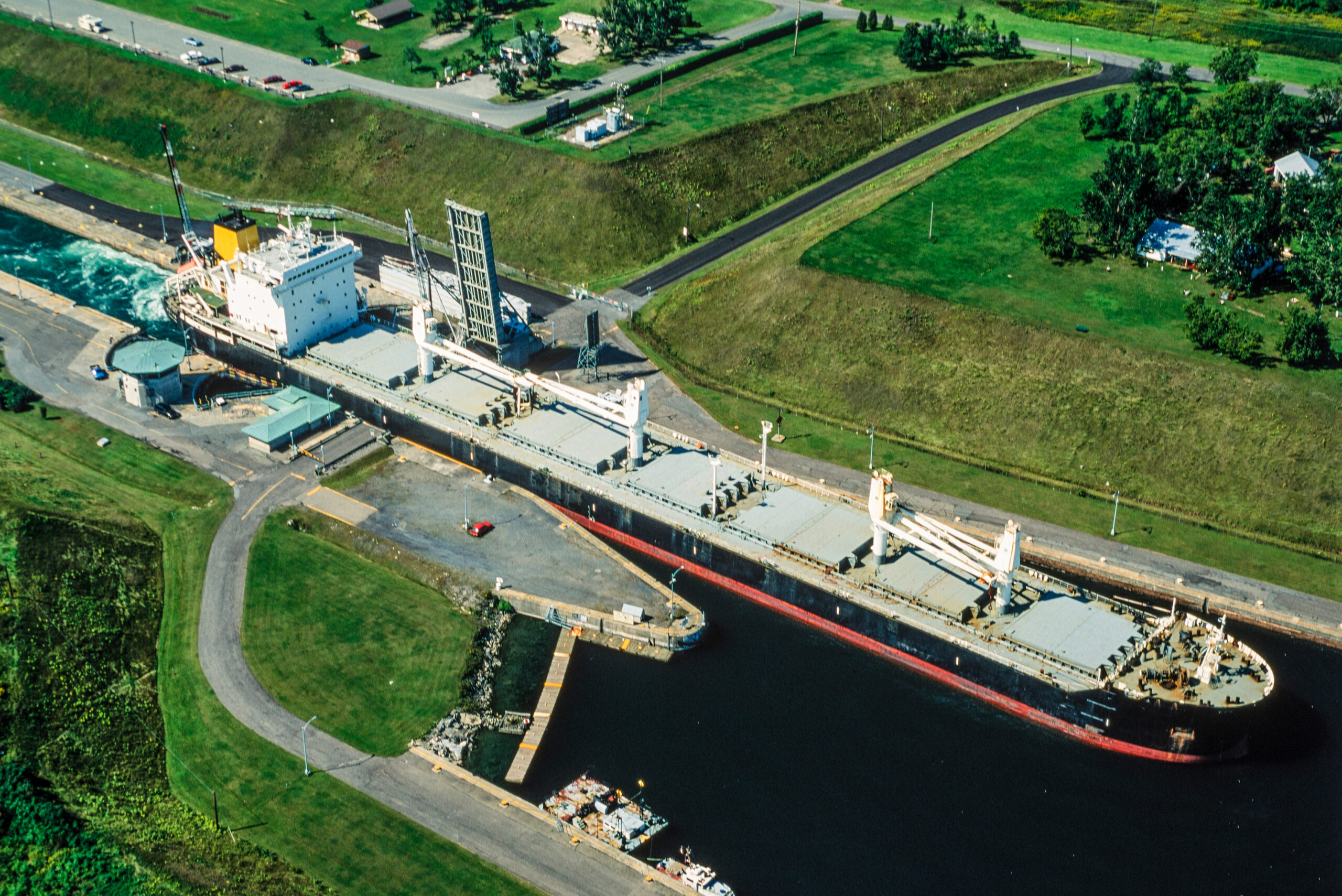 Aerial image of St. Lawrence Seaway,Ontario,Canada with a bulkcarrier passing.