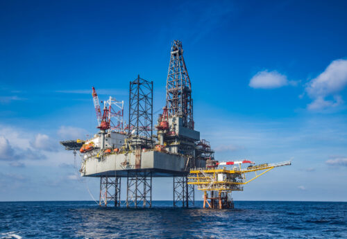 Offshore oil and gas drilling rig while completion well on oil