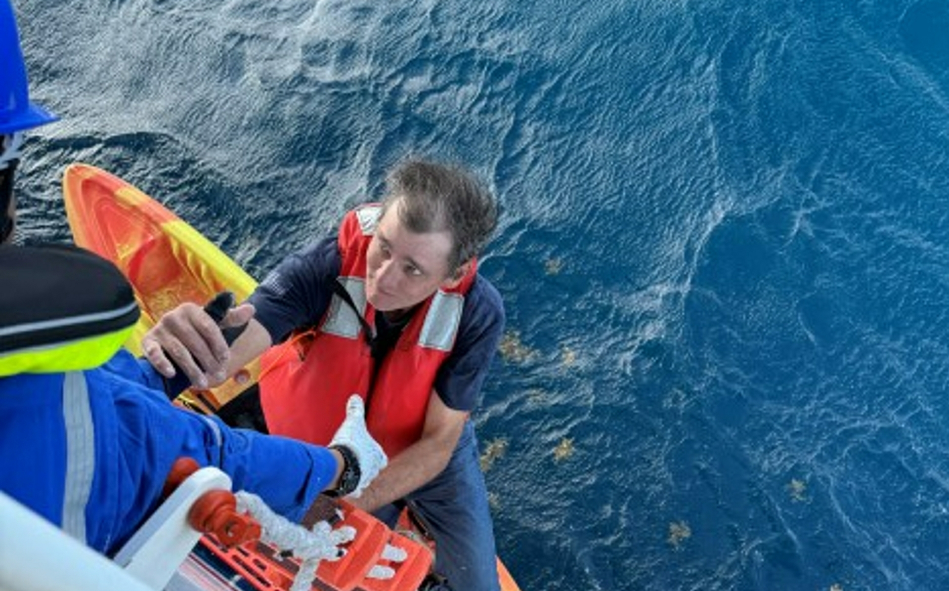 Ship’s Team Rescues Men Using Kayak to Stay Afloat After Boat Sank