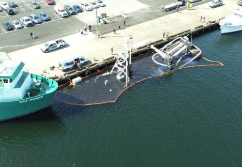 Crabbing vessel sinks at a pier in Seattle