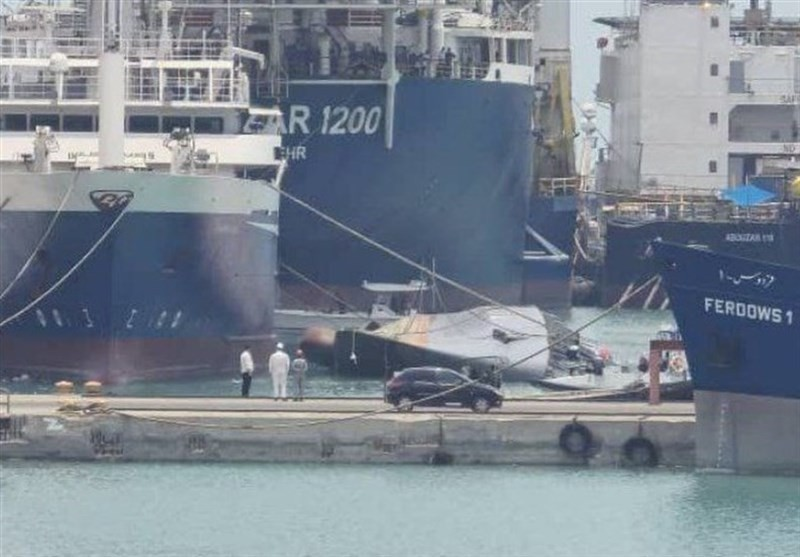 Iranian warship capsizes at the pier in Bandar Abbas