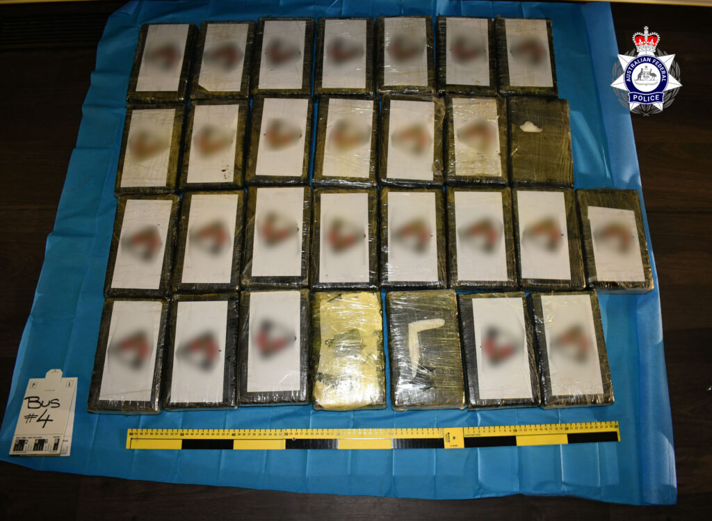 Two men jailed for 139kg cocaine import inside buses on a cargo ship