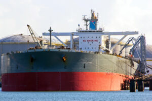 A very large crude oil tanker in the port of Rotterdam.