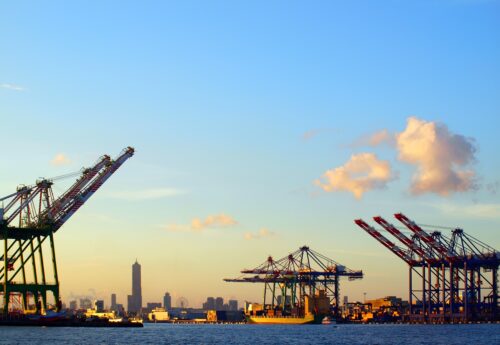 Kaoshiung container port with skyline in the background
