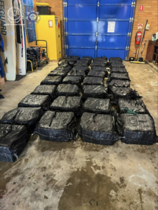 Five charged after $623.4m cocaine seized on vessel off NSW coast