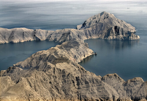 Strait of Hormuz, with a tanker in the background