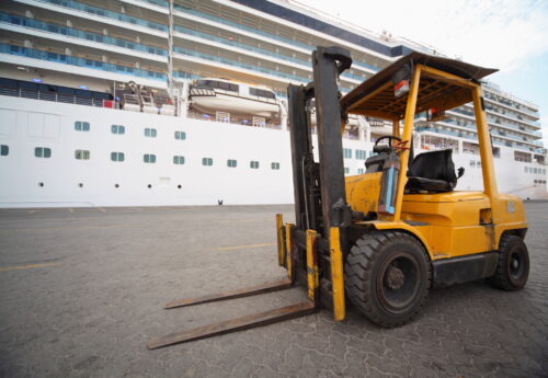 Falling forklift falls into sea and damages cruise ship at Greek port